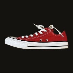 Red and white all star low top converse